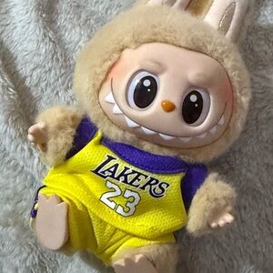 Yellow and Purple Stuffed Animal with Lakers Jersey